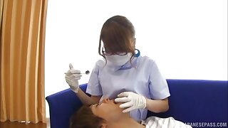 Busty Japanese doctor treats guy with different treatment